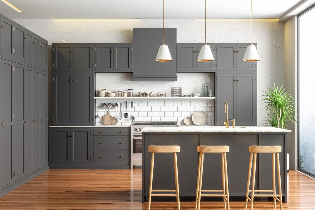 Contemporary kitchen with dark cabinets and pendant lighting